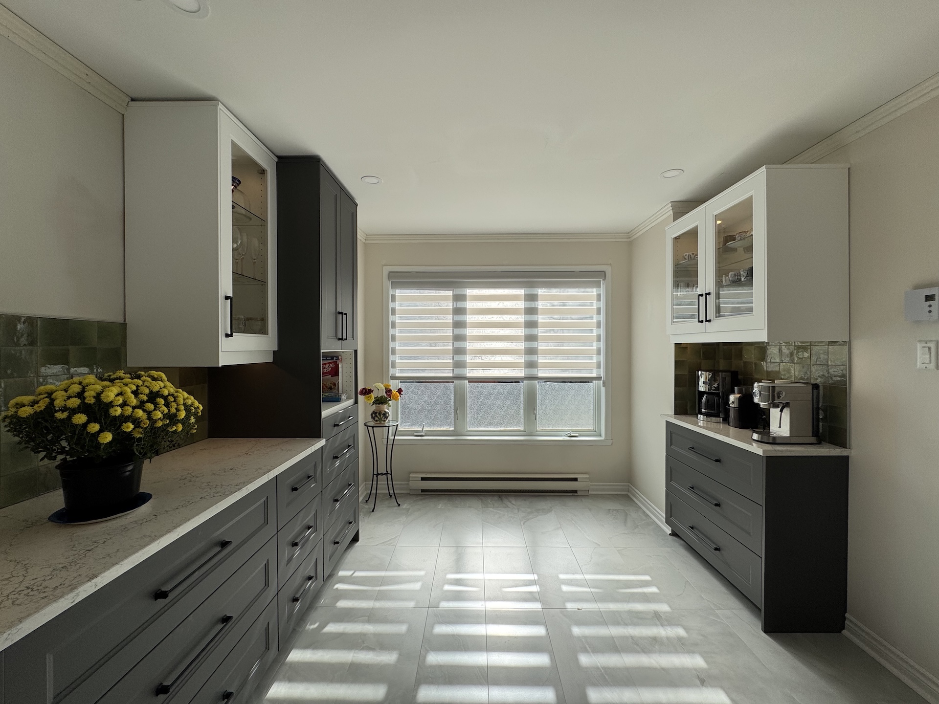 Custom built-in coffee station and pantry storage with quartz countertops